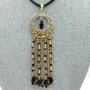 Gold Tone Circle Chandelier Necklace Black Beaded Tassel Pendant